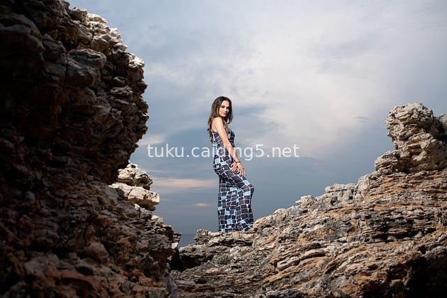 Fashion Rock Portrait: Beauty in Blue-White Maxi Dress (Retouched Photo)