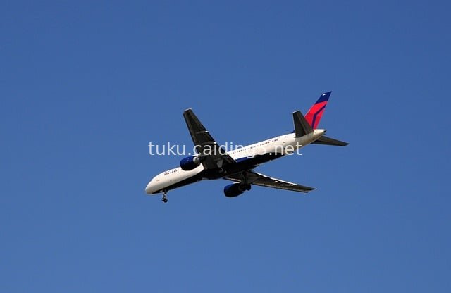 Commercial Airliner Soaring in a Clear Blue Sky