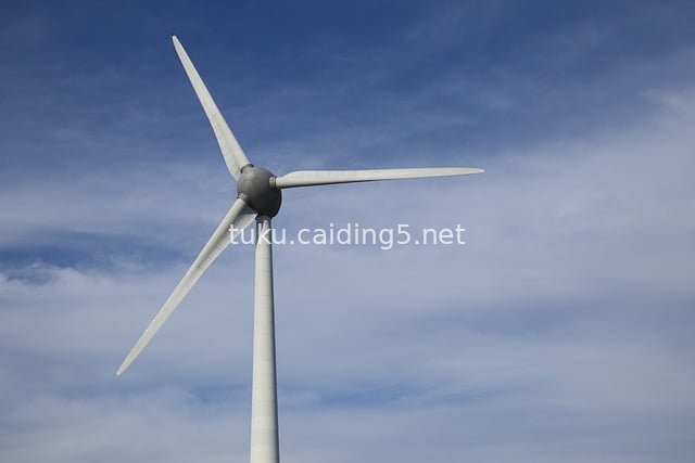 Wind Turbine Against a Blue Sky Background - Green Clean Energy Generation Equipment