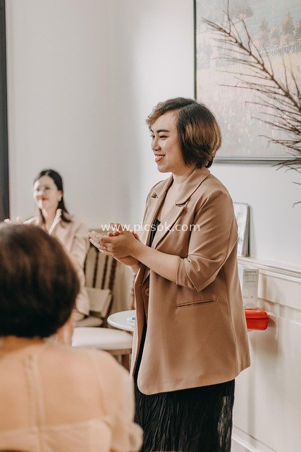 Professional Woman Hosting a Meeting - Team Collaboration Scene Material
