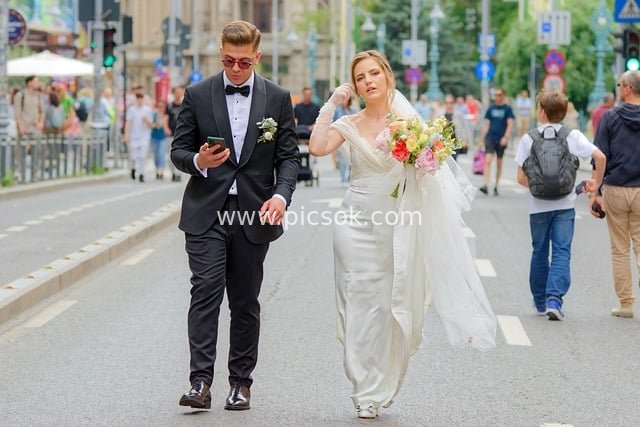 Newlyweds Stroll on Urban Streets: Happy Moments in Wedding Gown and Suit
