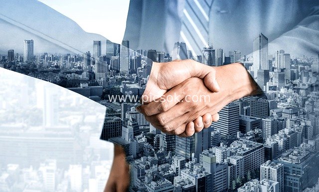 Business Handshake with Urban Background | Commercial Partnership