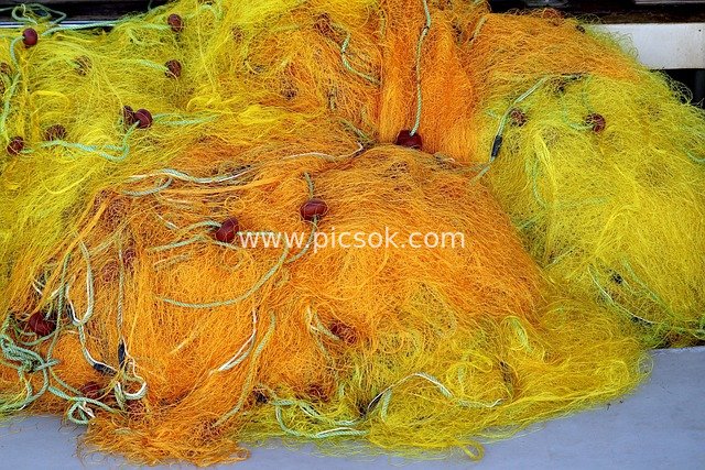 Colorful Fishing Nets in Naxos, Greece – Commercial Fishing Operation Scene