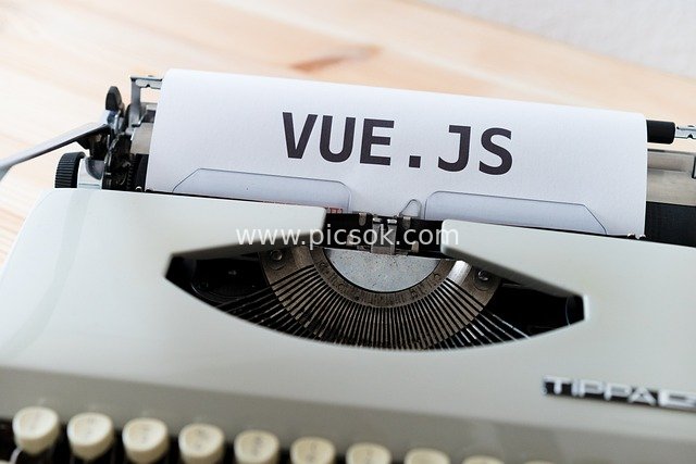 VUE.JS Featured on a Vintage Typewriter: Frontend Development Framework Resource