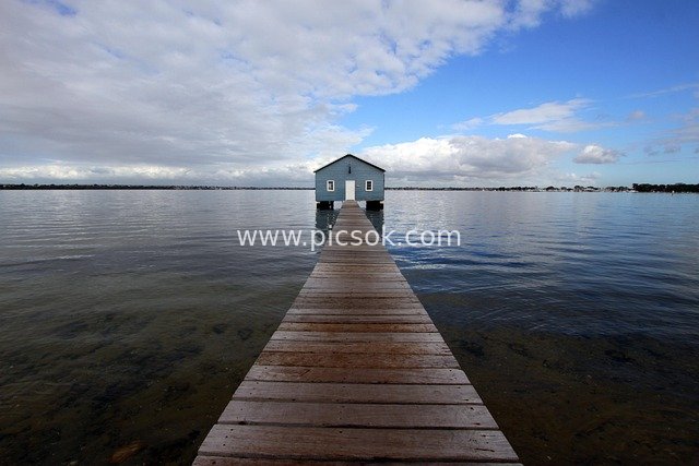 Scenery of Blue Boat House & Wooden Boardwalk by Swan River in Perth