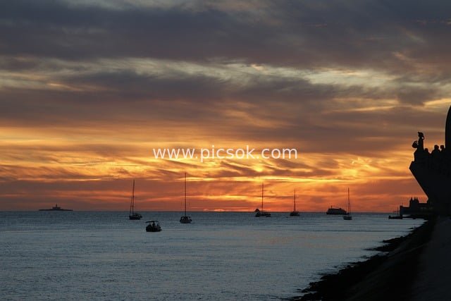 日落海面帆船剪影 晚霞天空唯美场景