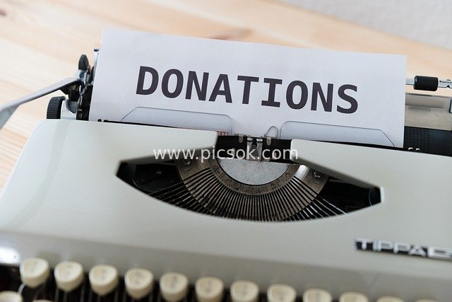 Vintage Typewriter Printing 'DONATIONS' - Charity Donation Fundraising Material