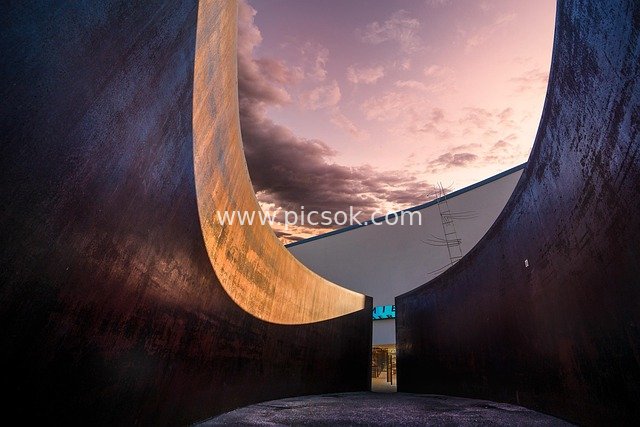 Urban Sculpture Architecture at Dusk: Creative Space Blending with Sunset Glow