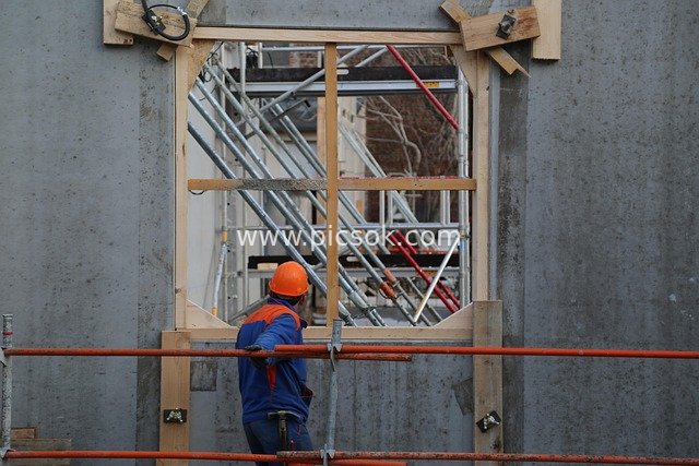 Real Shot of Construction Workers Wearing Safety Helmets on a Construction Site