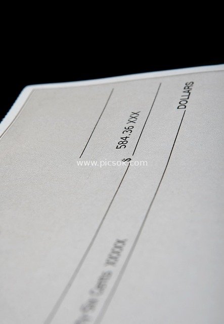 Close-up of a Gray US Dollar Check (Financial Instrument)