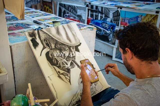 Cuban Street Artist’s Hand-drawn Creation: A Handcraft Art Workspace Scene