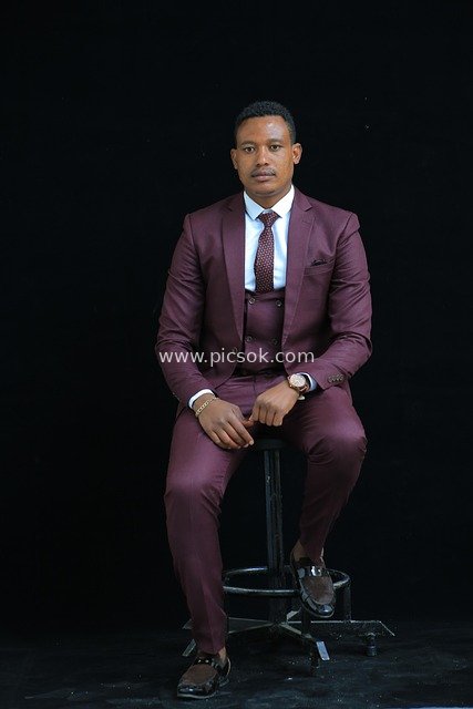 Professional Business Portrait of a Man in Burgundy Suit