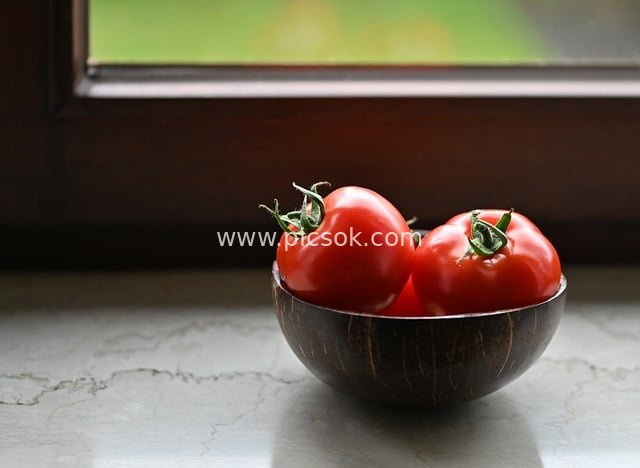 Fresh Organic Tomatoes on the Windowsill & Delicious Produce in a Dark Bowl