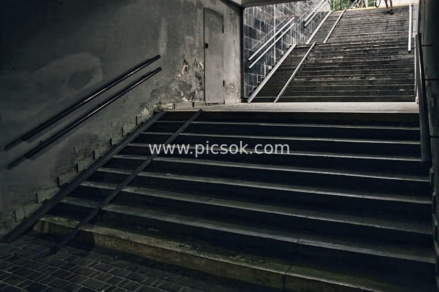 Dim and Dilapidated Urban Underpass Stairs - Abandoned Architectural Scene