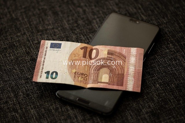Financial Payment Scene with 10 Euro Banknote and Smartphones
