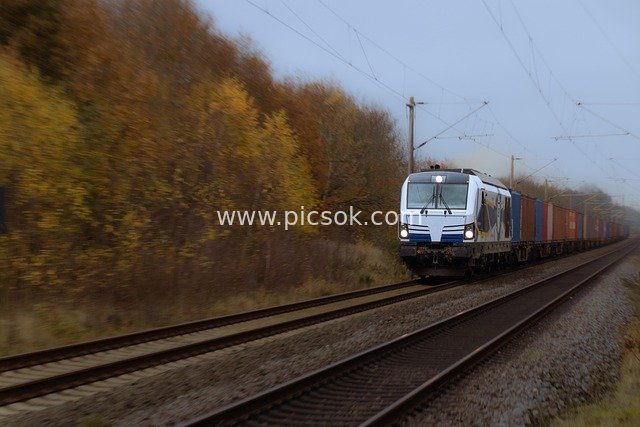 Autumn Freight Train Speeding: Container Logistics Transport Scene
