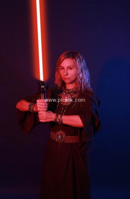 Star Wars Sith Cosplay: Female Character with Red Lightsaber
