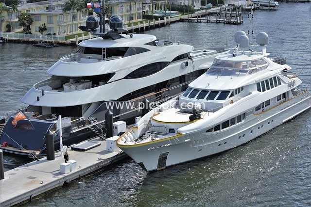 Luxury Yachts Docked at Marina Showcase Lavish Lifestyle