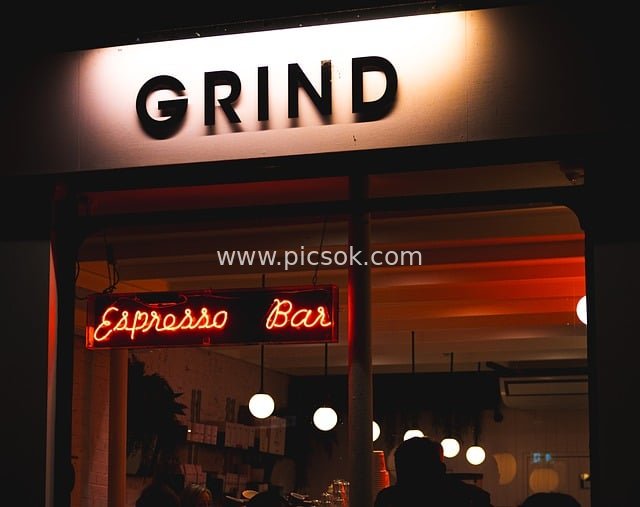 Urban Night Scene of GRIND Espresso Bar's Neon Sign