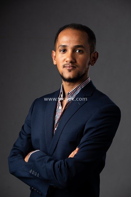 Portrait of a Professional Businessman in Suit with Crossed Arms