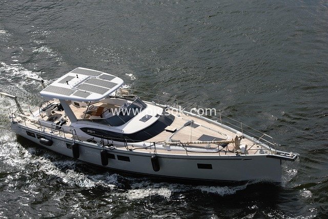 White Luxury Motor Yacht Cruising at Sea - Luxurious Sailing Experience