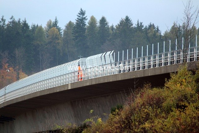 Highway Bridge Protection Facilities and Maintenance Scene in Fog