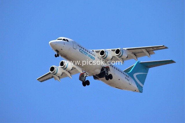 Cobham Aviation BAE146 Aircraft Landing – Blue Sky Flight Scene