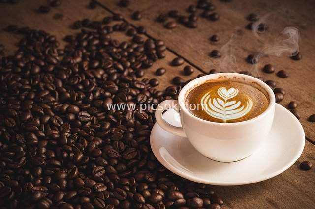 Aromatic Scene of Hot Latte and Roasted Coffee Beans
