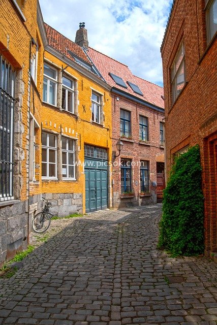 Old Town Alley in Europe: Colorful Old Buildings and Cobblestone Streets