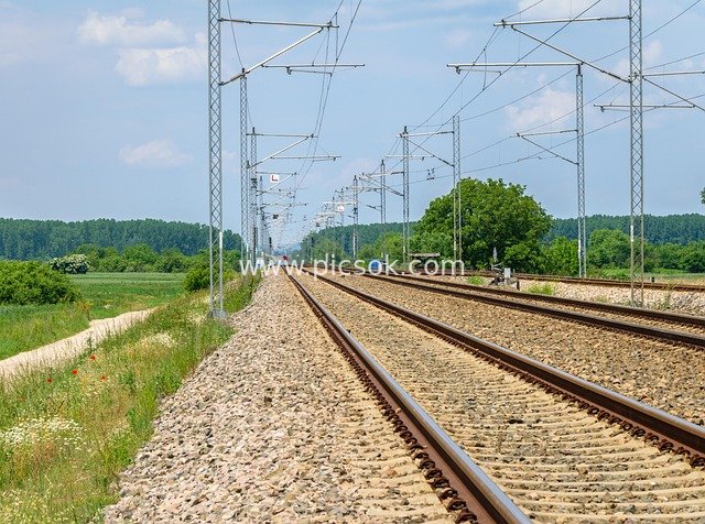 Natural Landscape of Summer Rural Electrified Railway Tracks
