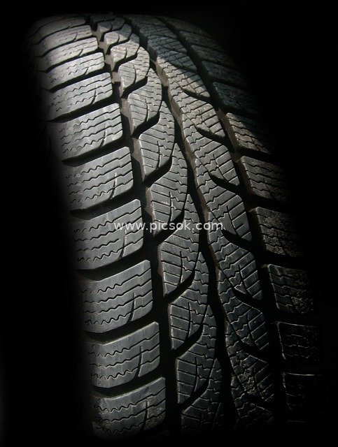 Close-up of Winter Anti-Skid Car Tire | Detailed Display of Snow Tire Treads