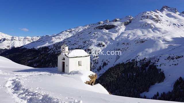 White Chapel in Winter Snowy Mountains: A Breathtaking Snowy Hiking Destination