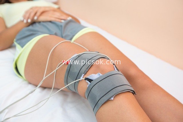 Real Shot of Knee Physiotherapy Rehabilitation Scene in Hospital/Clinic