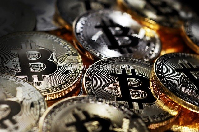 Close-up of Physical Bitcoin Coins - Cryptocurrency Financial Investment Material