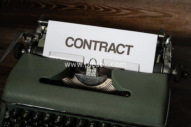 Printed Contract on a Vintage Typewriter - Commercial Legal Document Scene