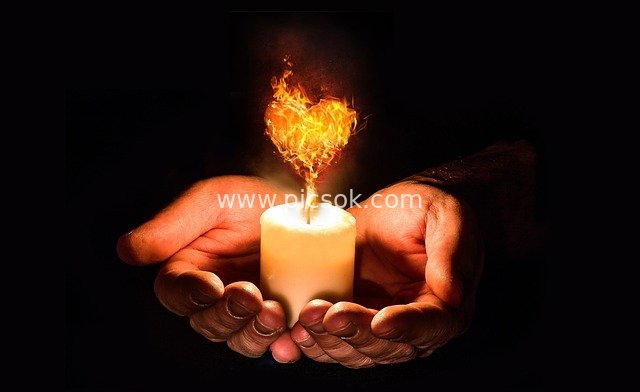 Hands Cupping a Candle with Heart-Shaped Flame: Conveying Love and Hope in the Dark