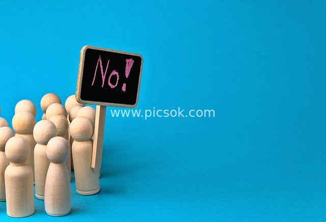 Wooden Puppets Protesting with Signs - Creative Material on Blue Background