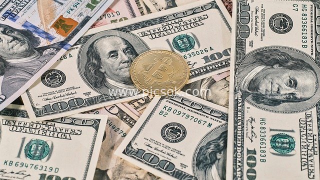 US Dollar Bills and Bitcoin Coins: Fusion of Traditional and Cryptocurrency