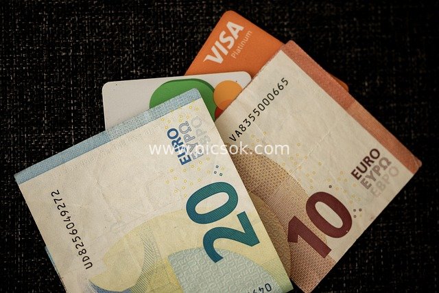 Close-up of Euro Banknotes and Credit Cards, Financial Wealth and Savings Scene