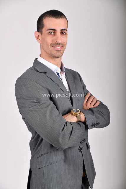 Confident Businessman in Suit Exudes Professional Success and Elegance