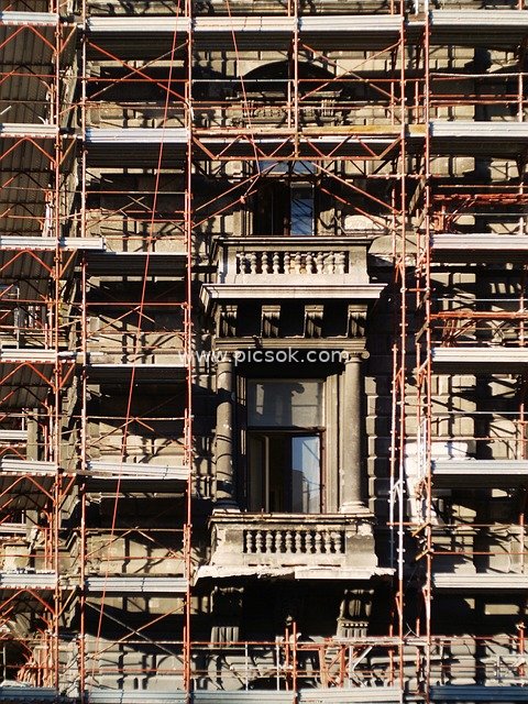 Restoration of Old Buildings in Budapest: European Balconies Beneath Scaffolding