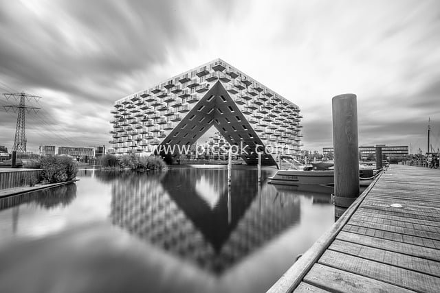 Black and White Waterfront Photography of Sluishuis Building in Amsterdam