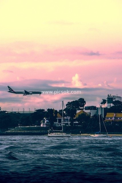 新加坡乌敏岛海滨 飞机低空飞行日落美景