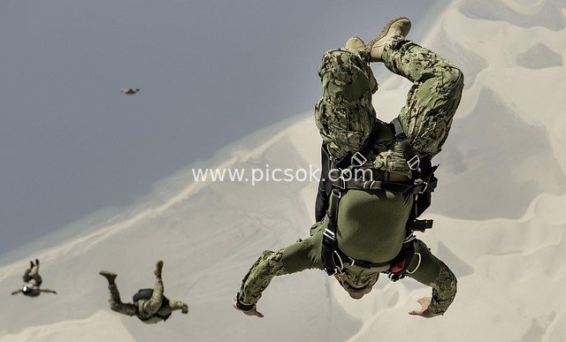 Special Forces High-Altitude Parachute Training – Camouflaged Soldiers Executing Parachute Maneuvers