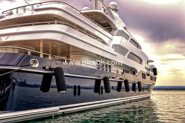 Luxury Yacht Moored at Harbor: Lavish Nautical Scene at Dusk