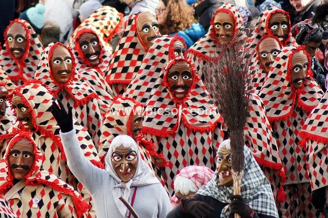 Carnival Parade: A Folk Celebration Scene with Masked Participants