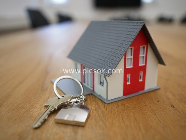 House Model with Keys - Real Estate Transaction and Home Purchase Material