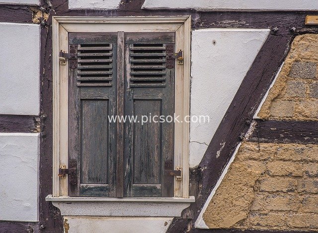 Close-up of Vintage Window on Half-Timbered Historic Building