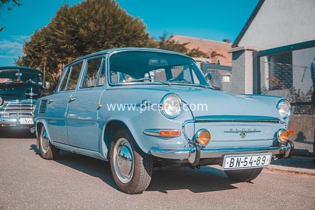 Blue Vintage Classic Car: Outdoor Nostalgic Auto Display