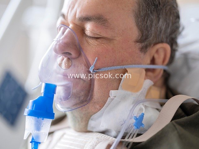 Medical Scene: Male Patient Receiving Oxygen Therapy in Hospital
